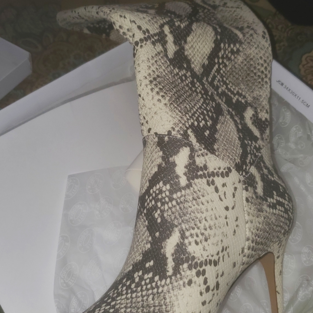 Steven Madden Kinga Nat snake boots